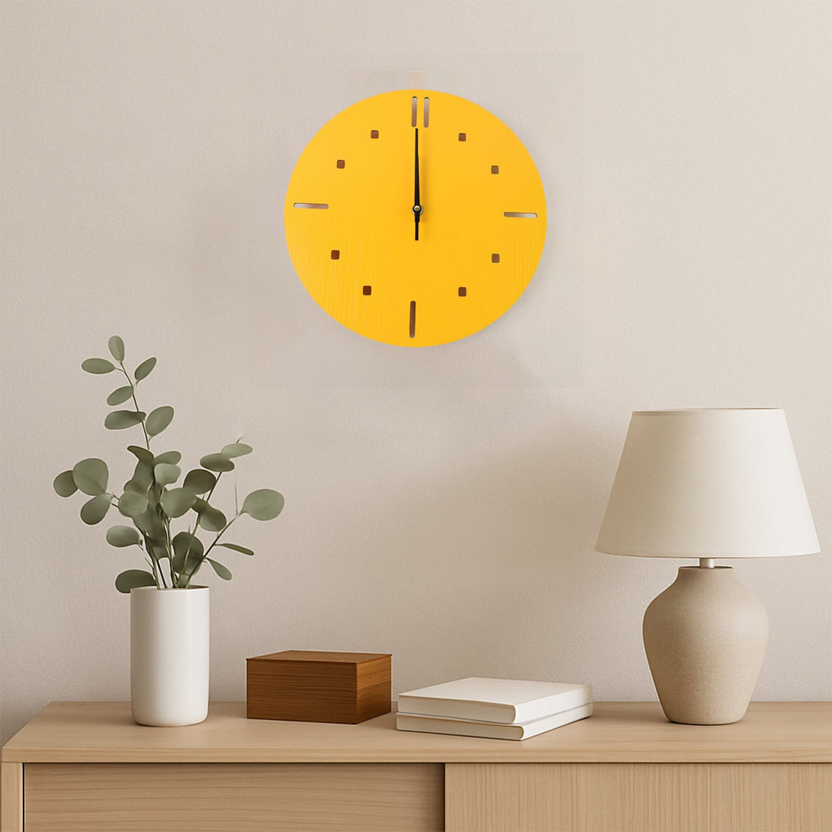Side view of yellow round wall clock showing slim profile