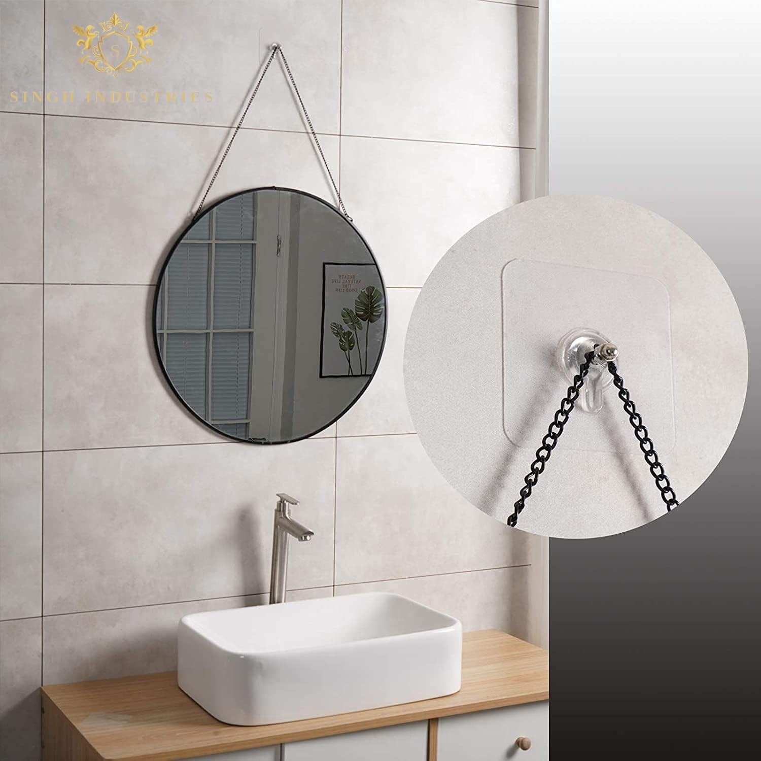 Wall hook holding a photo frame applied on wall