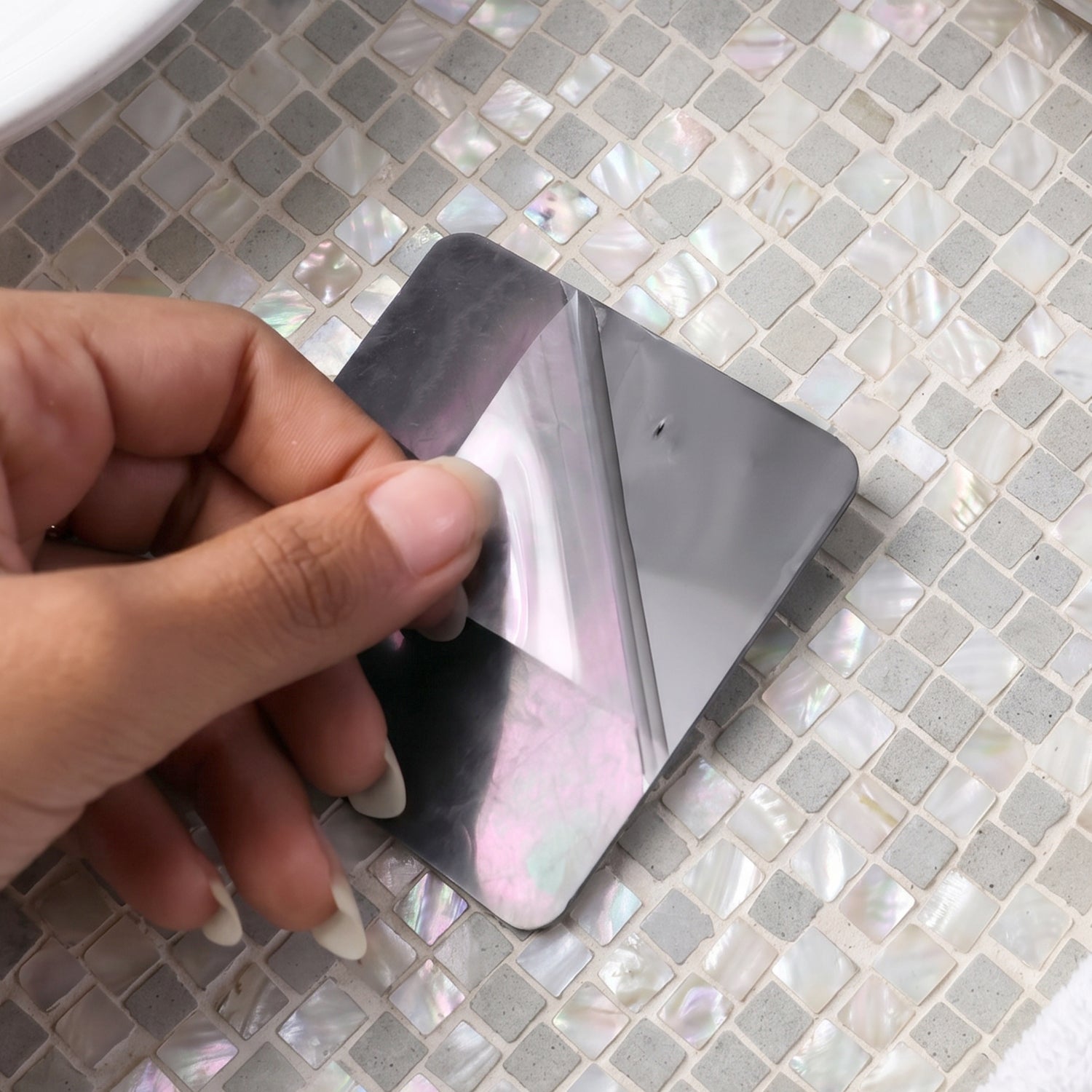 Self-adhesive hook for household organization